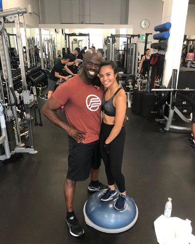 Picture of Louriza Tronco with her Trainor Garfield Wilson.